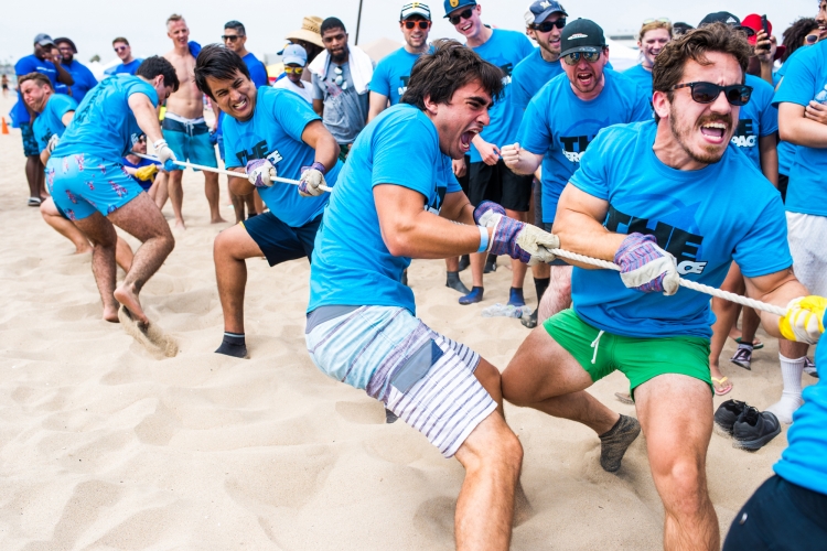 Aerospace team playing tug of war